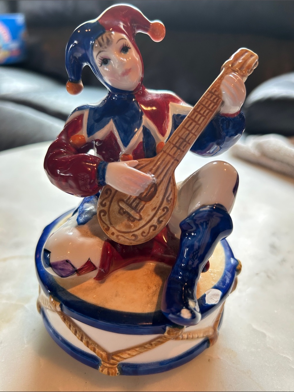 Porcelain Harlequin Musician Figurine in Red & Blue - plays music